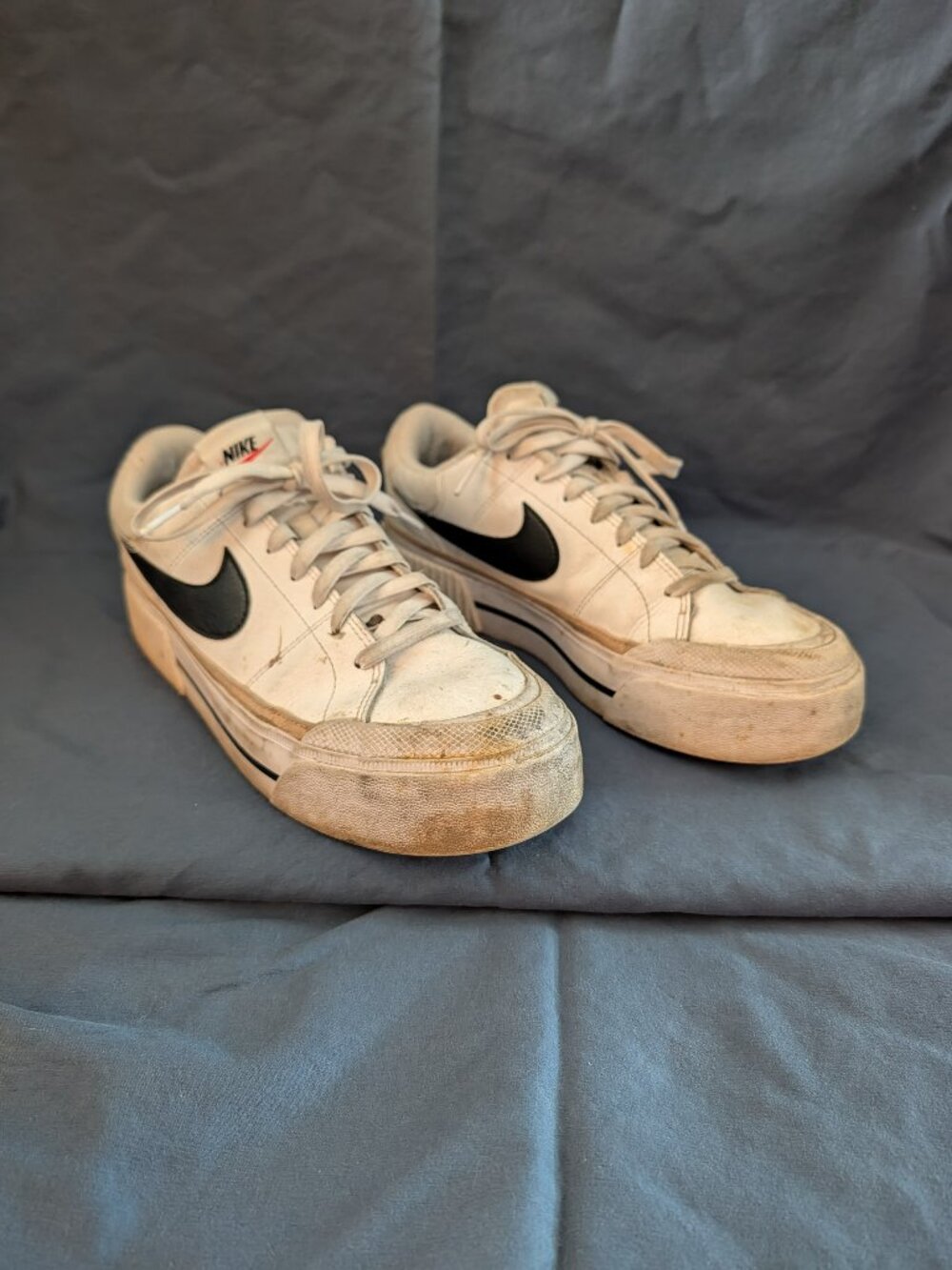 Well Worn Nike Shoes
